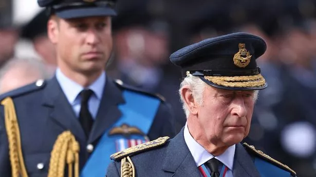 King Charles and Prince William walking behind the coffin of his mother Queen Elizabeth II